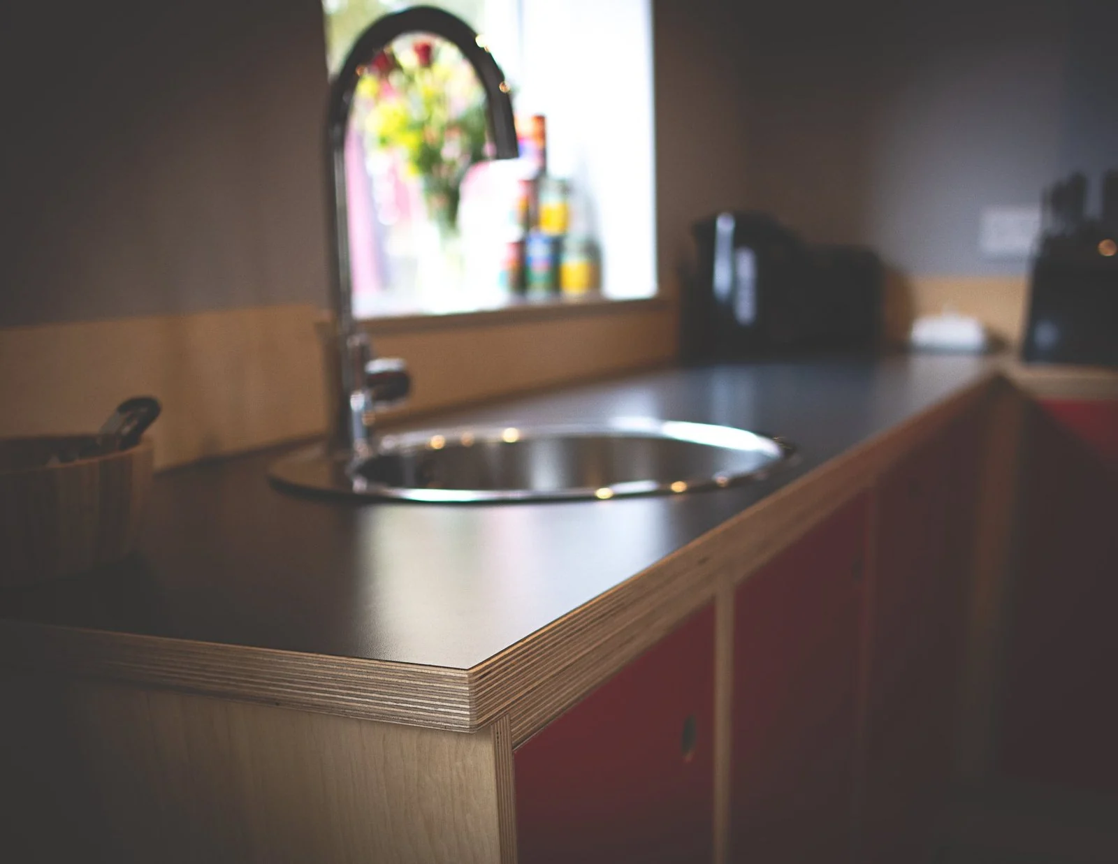 Bespoke plywood kitchen worktop and circular inset sink